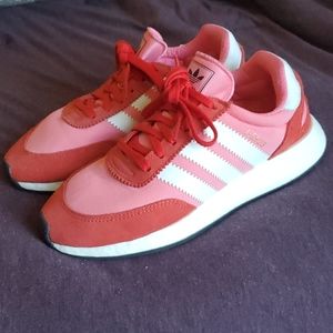 Red and Pink Adidas running shoes